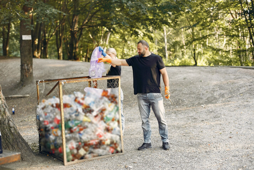 Junk metal removal service collecting waste materials outdoors